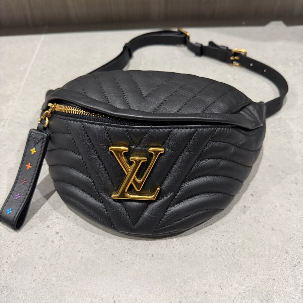 Authentic Louis Vuitton Black Quilted Leather Waist Bag with Gold Logo